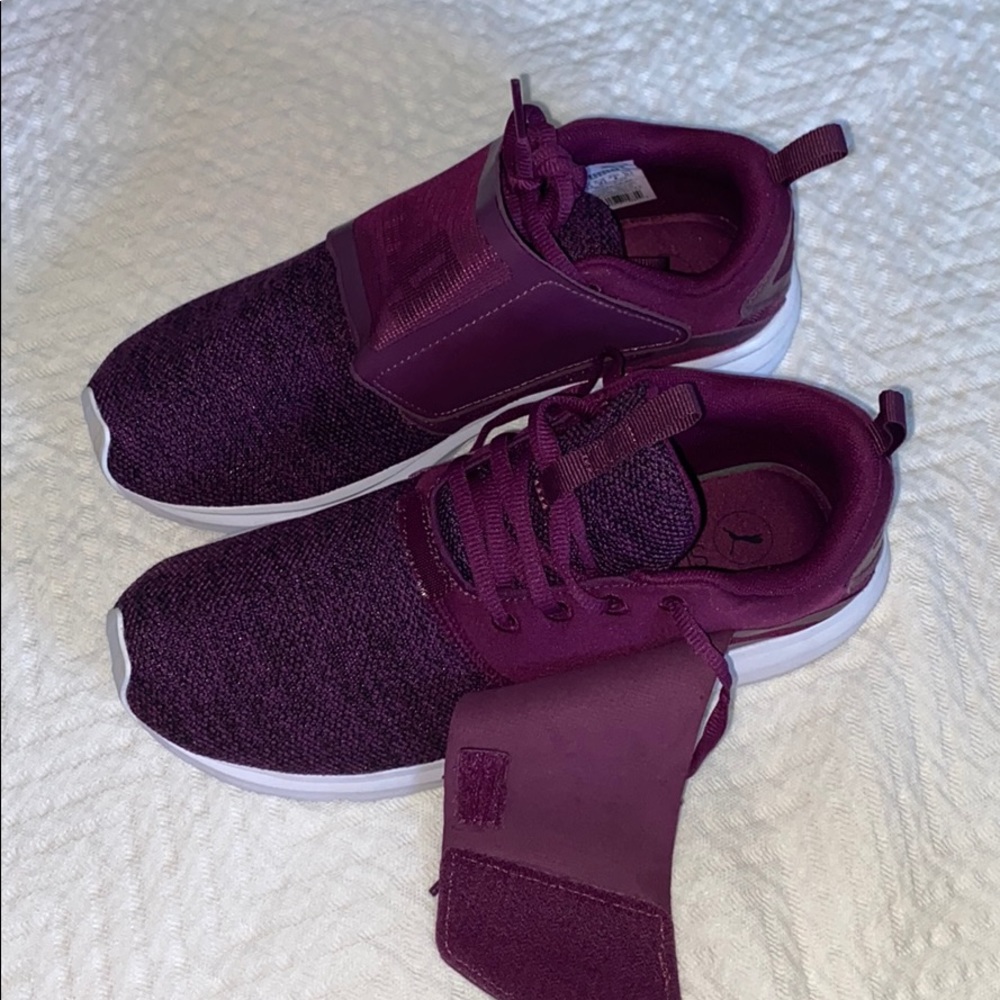 Never worn purple puma sneakers